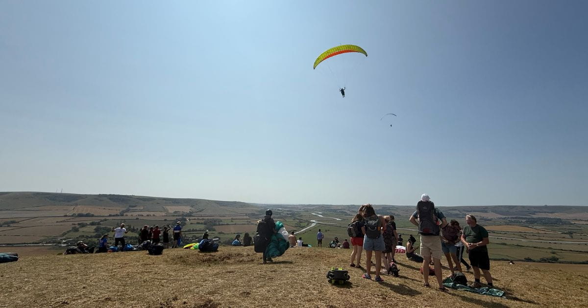 Paragliders at the top of Mount Caburn East Sussex