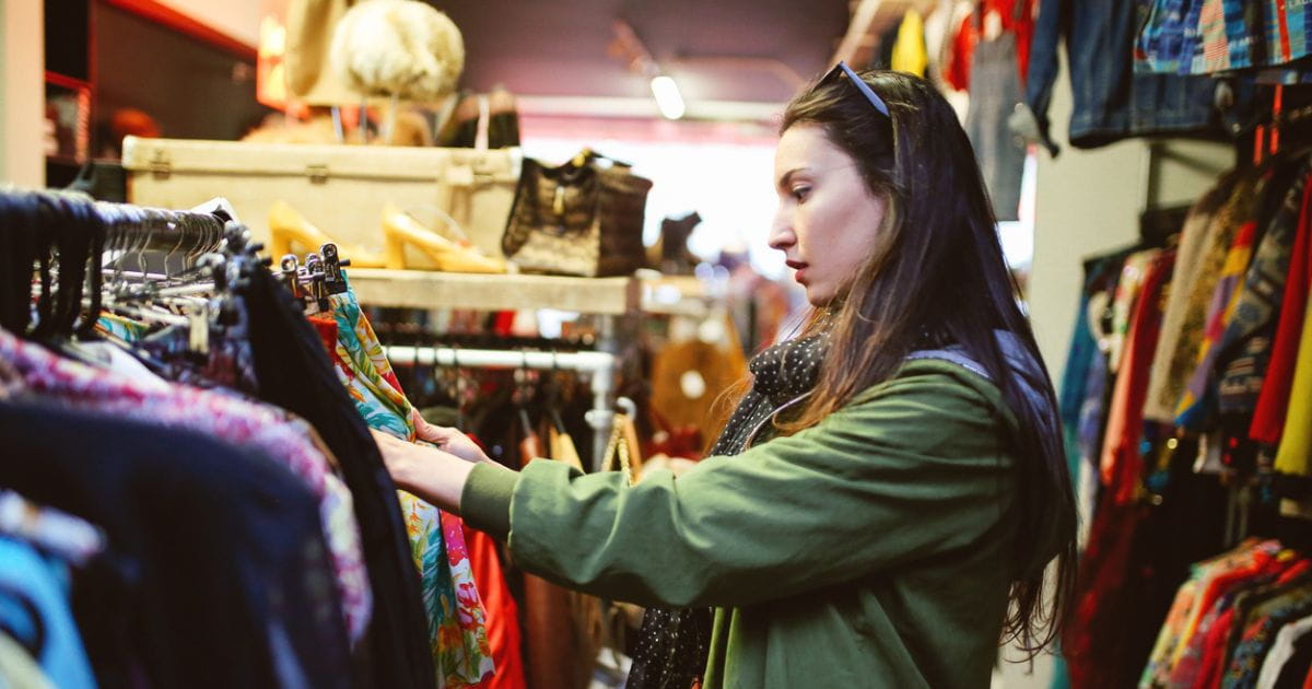 stock image of a person browsing fashion clothing