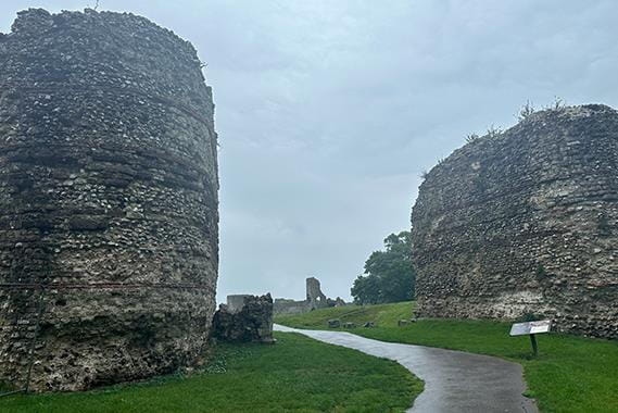 A walking path between two old walls