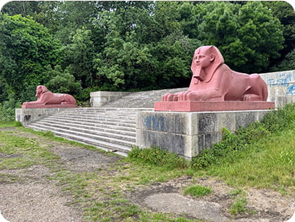 Two sphinx statues on steps