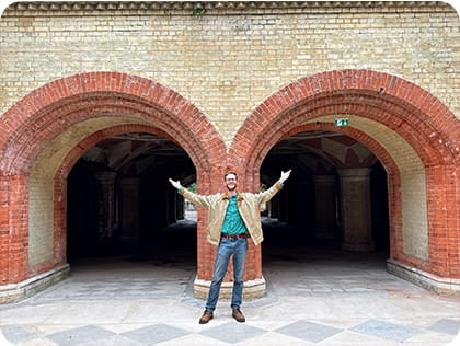 Man standing in the atrium at Crystal Palace