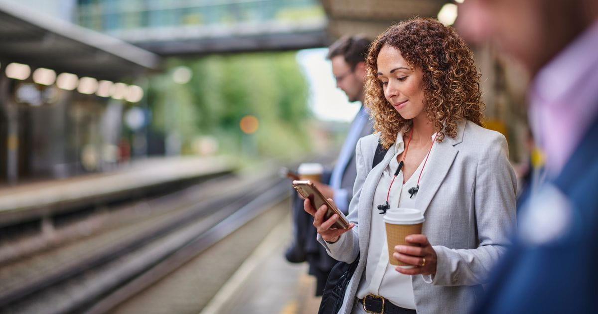 Woman standing on a railway platform