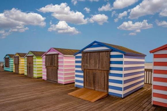 Hastings seafront attractions pier striped cabanas
