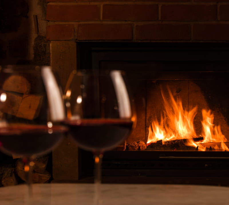 a stove top oven sitting inside of a fire place