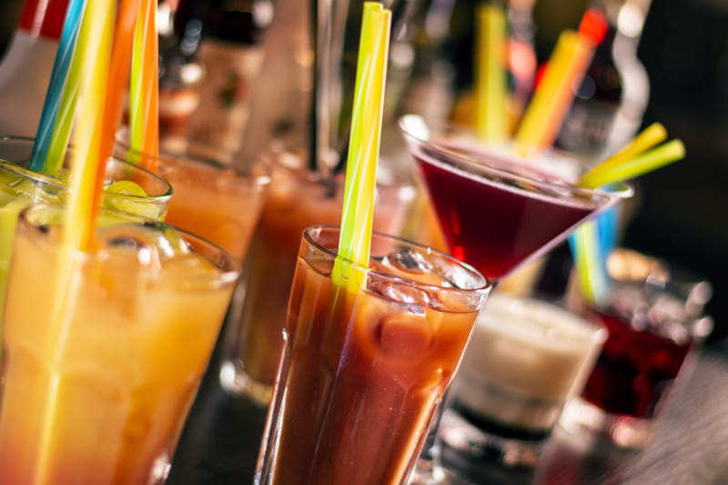 a close up of a glass of orange juice