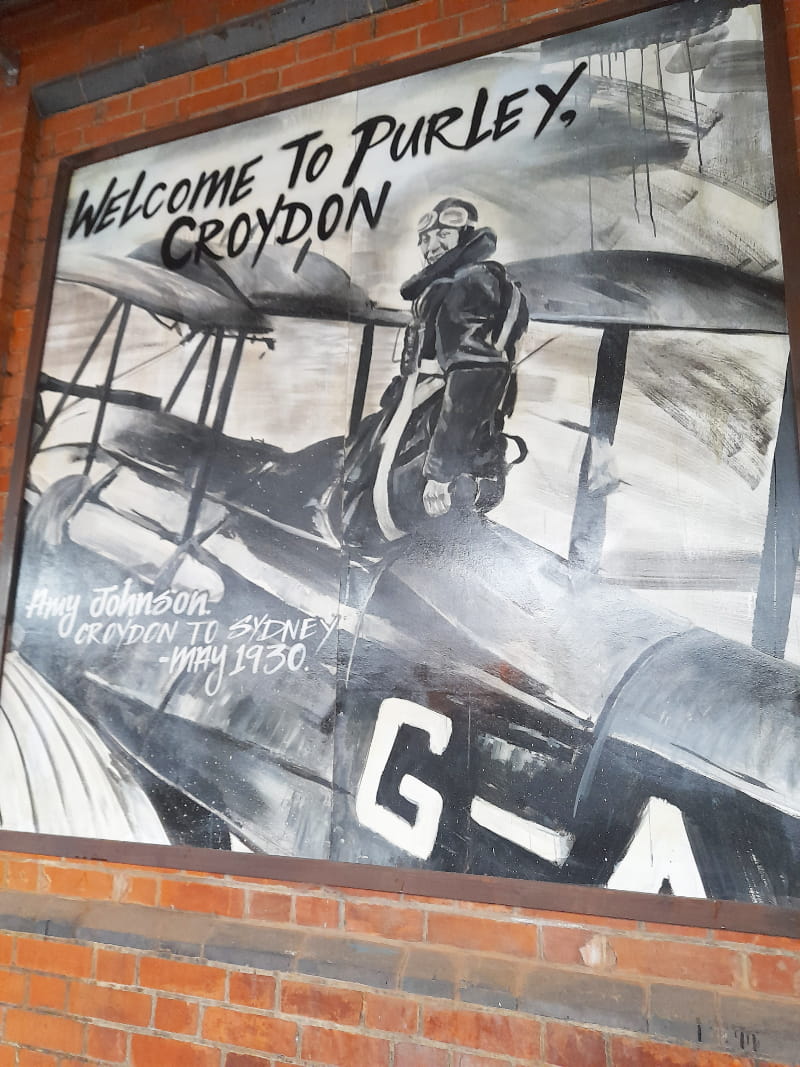 a plane sitting on top of a building
