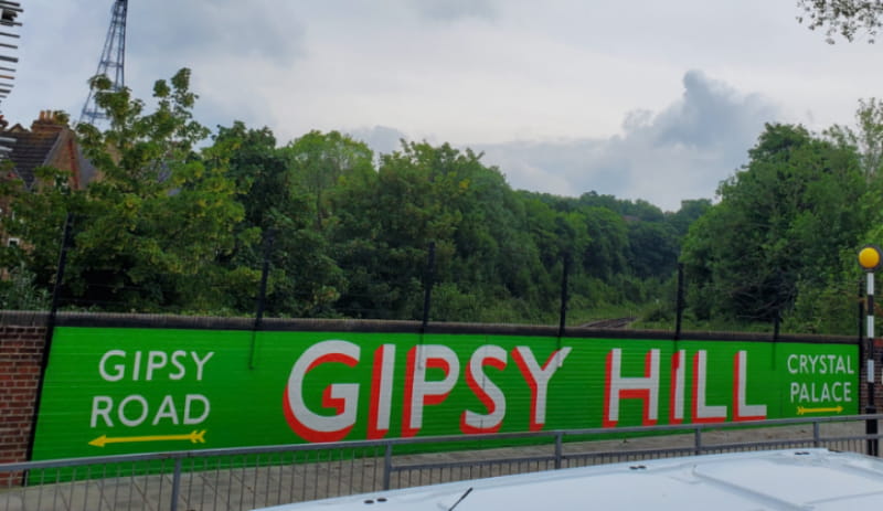 a sign on the side of a road