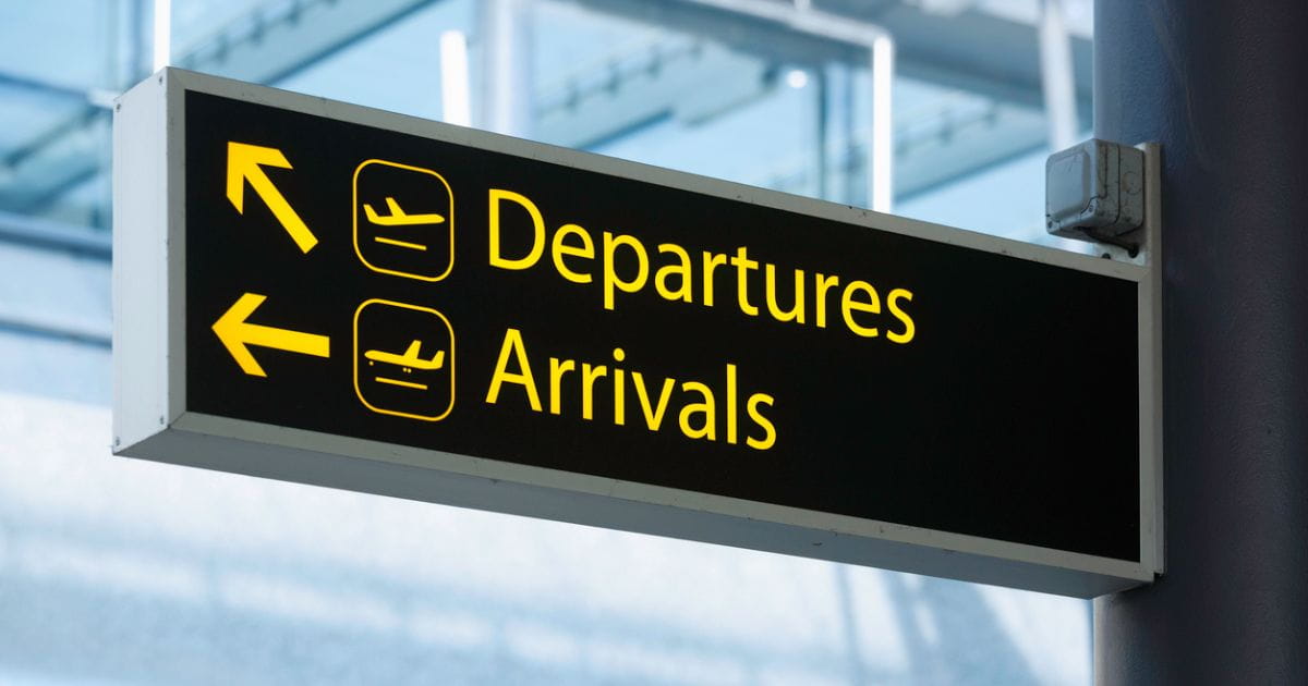 Departures and arrivals sign at airport