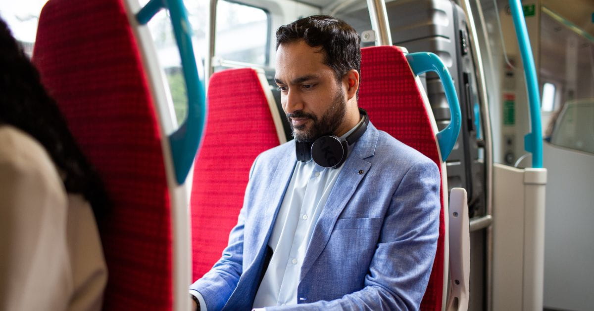 A man travels on the Gatwick Express to Gatwick Airport