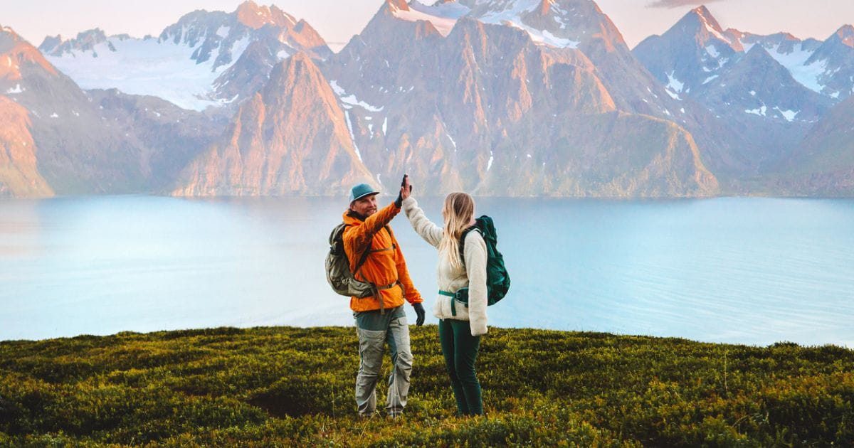 Two people hiking in Norway Scandinavia holiday