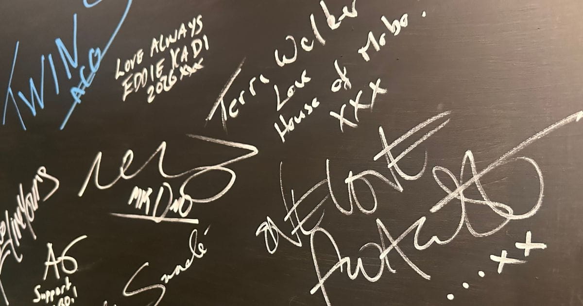 House of Mobo Wall of Fame with famous signatures