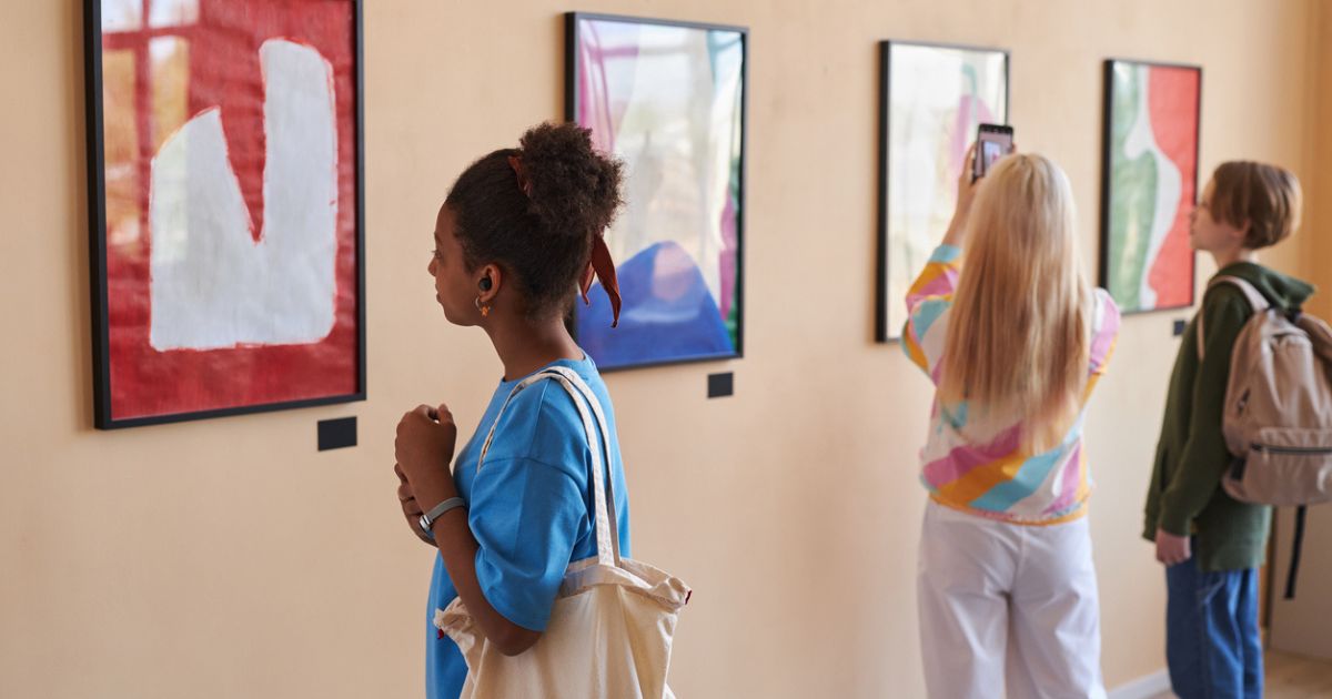 People browsing art in a gallery museum