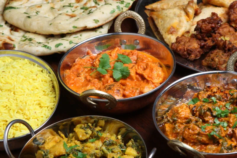 a bowl filled with different types of food on a table