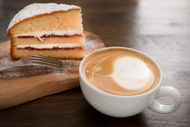 a piece of cake and a cup of coffee