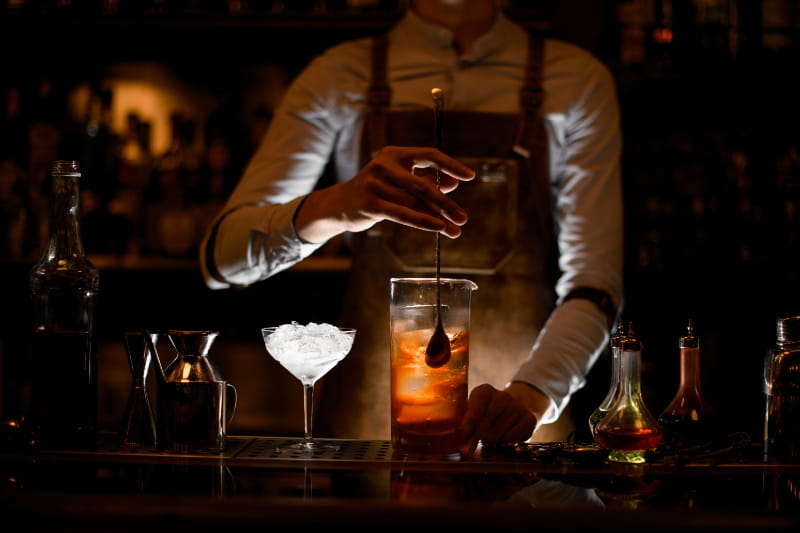 a person holding a glass of wine
